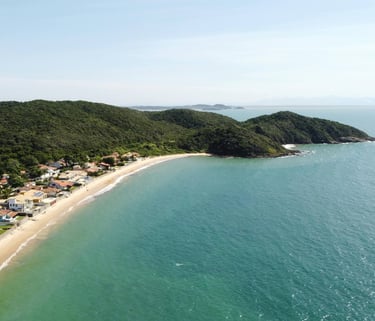 a beach with a sandy beach and a sandy beach in Buzios, Rio de Janeiro, Brazil