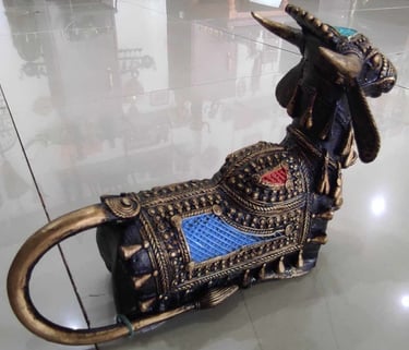  "Sitting brass designer bull figurine with vibrant red and blue detailing – ethnic brass art-for export markets"