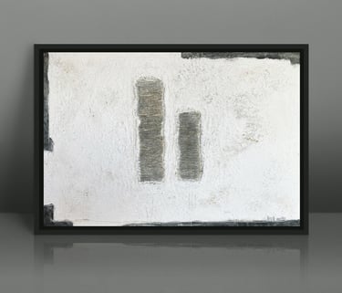 Framed minimalist abstract art print featuring textured grey pillars on a white canvas background.