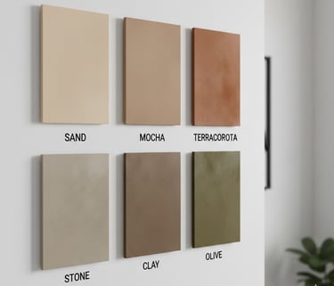 Six colorful acoustic wall panels in various shades displayed on a white wall for sound dampening.