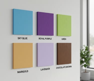 Six colorful square acoustic wall panels in blue, purple, green, gold, lavender, and brown.