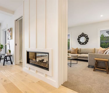 formal lounge with custom gas fireplace - Highend Homes