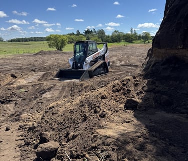 skid-steer-moving-dirt.jpg
