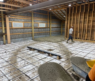 Machine shop floor 6 inches of concrete with rebar and a floor drain.