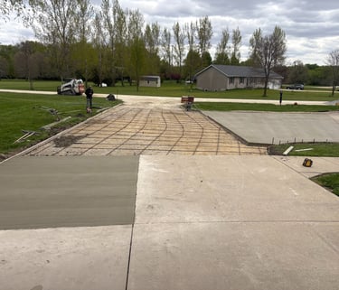 Concrete driveway construction with rebar.
