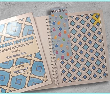 open coloring book with a colored page and a snap in bookmark that says "COLOR ON"