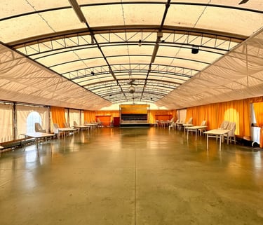 a large room with a lot of chairs and tables