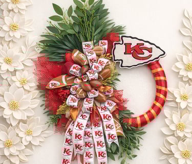 Custom Kansas City Chiefs football wreath with red and gold ribbons, miniature footballs, and team logo.