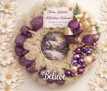 Thomas Kinkade Christmas wreath with purple ornaments and a snow-covered cottage scene.