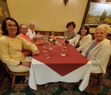 A picture of people sitting at a table.