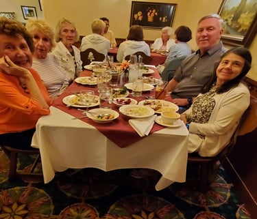 A picture of people sitting at a table.