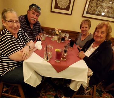 A picture of people sitting at a table.