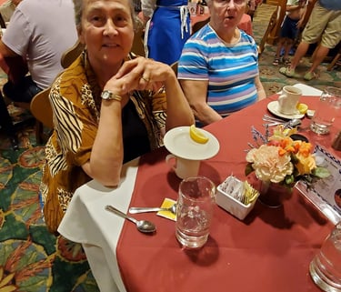 A picture of people sitting at a table.