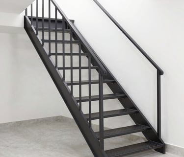 Close-up of a custom metal door with industrial design and welding details.