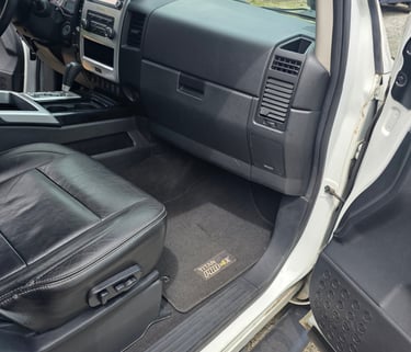 Interior automotive detailing cleaning vehicle carpets and upholstery