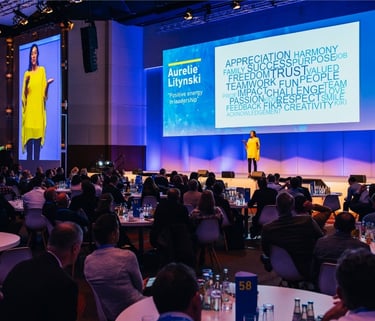 Aurelie on stage - Leading with Emotional Intelligence in the Age of Artificial Intelligence