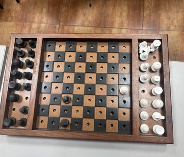 A chess board with tactile pieces 