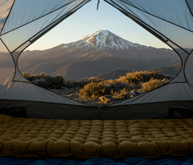 Scenic view of easy setup tent with a mountain view in the background