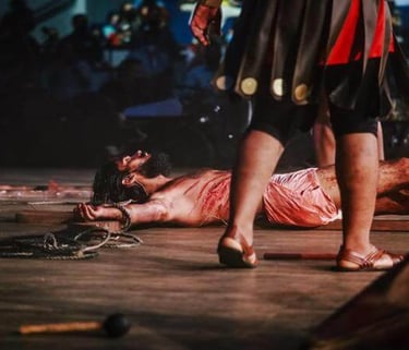 a man lying on the floor with blood