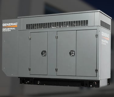 Industrial size generac generator with a blurred image of a industrial building in the background