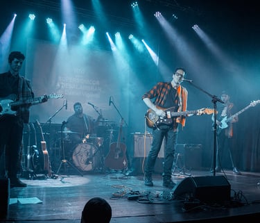 The Supersonicos playing surf music in a concert