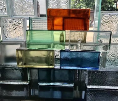 a bunch of glass blocks with different colors