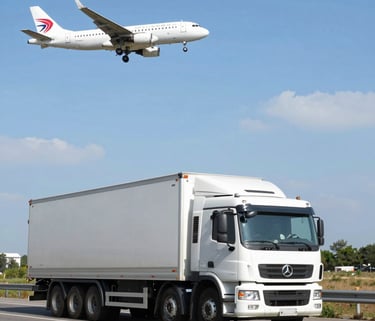 Close-up of a professional spray gun applying red paint on a metal surface.