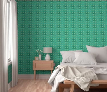 a bedroom with a bed and green wallpaper