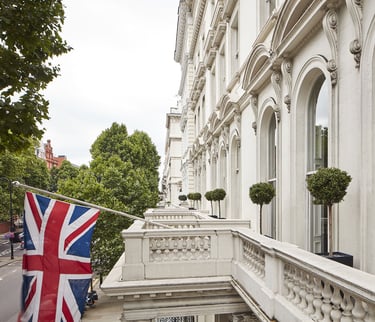 Queen’s Gate Hotel London – Elegant British hotel with Union Jack flag.