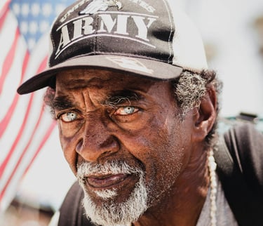 a man with an army hat on
