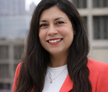 Headshot of Elizabeth Cambray-Engstrom in a red blazer