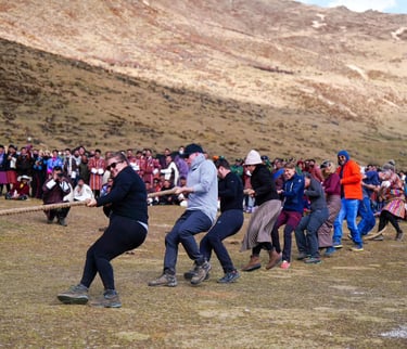visitors-trying-tug-of-war-against-the-local-inhabiitants-of-the-highland-at-laya-bhutan