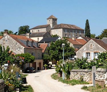 an alley way with tables and chairs and umbrellas