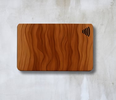 a wooden NFC card with a wireless logo attached to it. made in paranaque