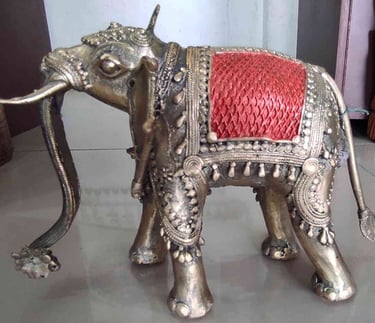 Artisan-made tribal brass elephant featuring red-painted design on the back-Meant for export