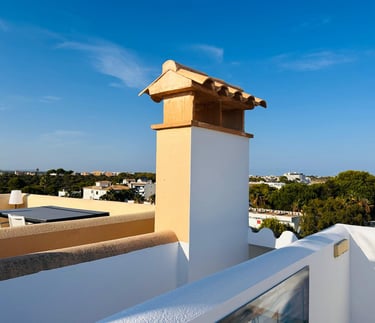 a balcony with a view of the ocean and a view of the ocean