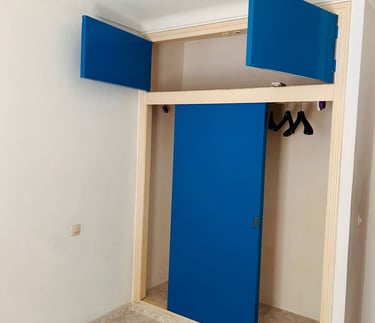 a blue door with a blue door and a pair of shoes