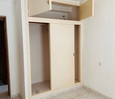 a room with a closet and a closet