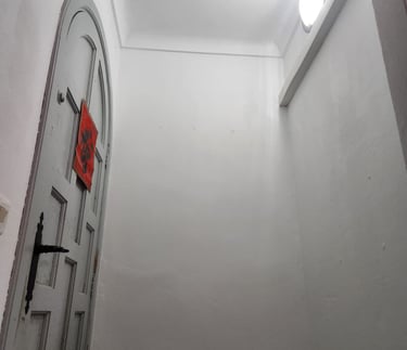 a door way with a red sign on it