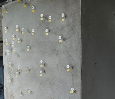 Bullet holes in one of the supporting beams of Jeonil Building 245