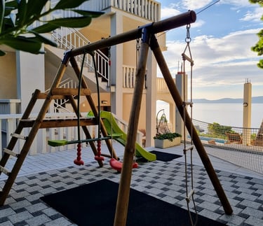 Children's swing and slide with Adriatic sea view, Easy Living Holiday Home, Lokva Rogoznica