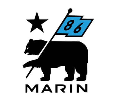 Marin Bikes California republic logo featuring a black grizzly bear, star, and blue flag with 86.