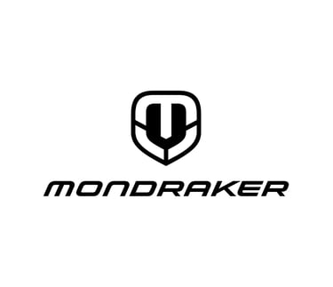 Mondraker mountain bike brand logo featuring a black shield emblem and bold typography on a white background.