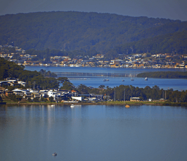 Looking south from President's Hill, Gosford. Saratoga Oval and sailing club, Blackwall on the far shore.