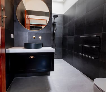 Designer Black Bathroom by Qualitas Builders in Auckland