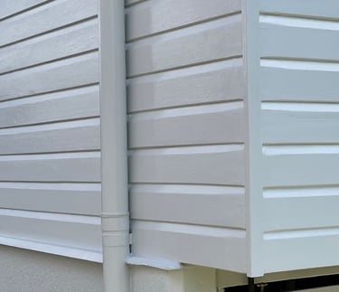 Close-up of finished exterior weatherboards after repainting by PJCPainters