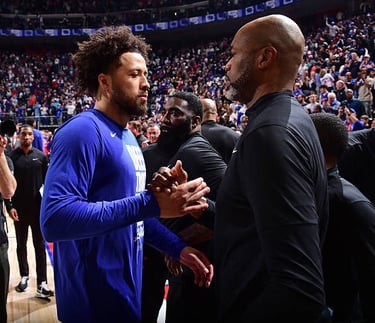 Cade Cunningham (left) and Magic head coach Jamahl Mosley (right) shake hands following the Pistons game 7 victory.