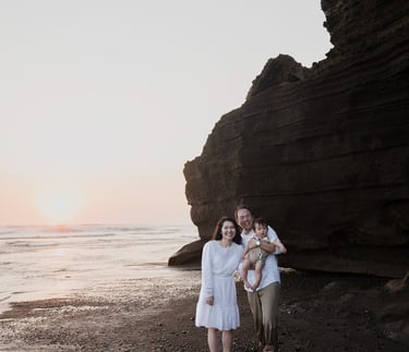 Family portrait near the cliffs of Nyanyi Beach Tabanan Bali captured during a natural family photography session