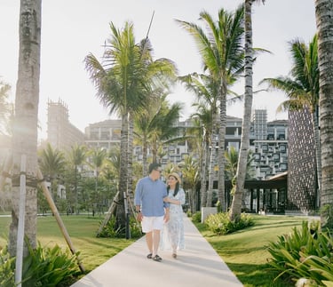 Couple photography session surrounded by tropical gardens at The Apurva Kempinski Bali in Nusa Dua