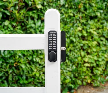 Metal gate with push button lock